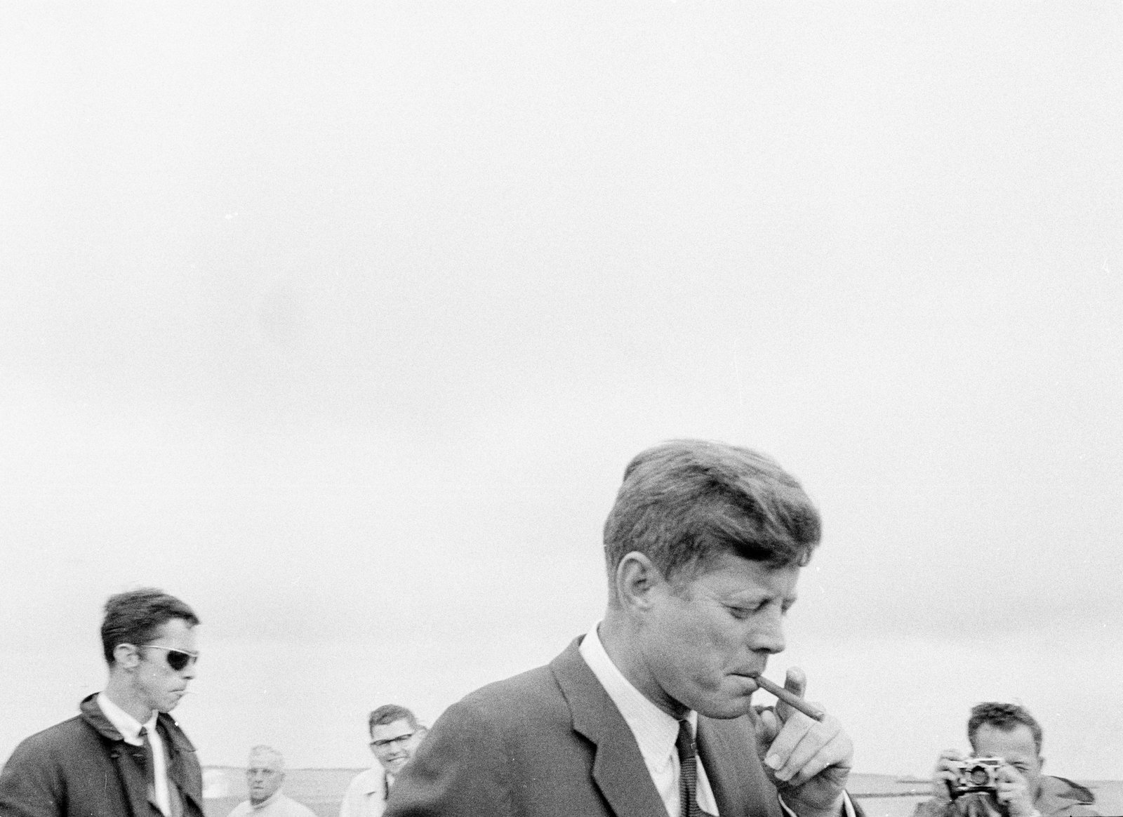 President John F. Kennedy smoking a cigar in Hyannis Port, Massachusetts